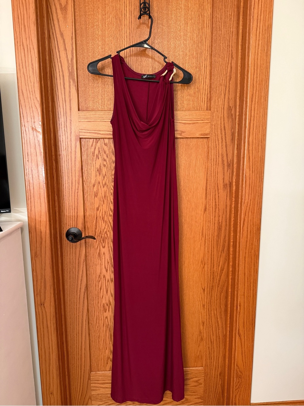Blue Blush maxi dress with cowl neckline and gold hardware on one shoulder